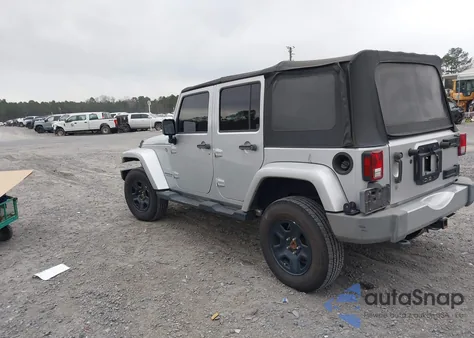 2009 Jeep Wrangler Unlimited Sahara from USA, damaged, VIN 1J4GA591X9L759880